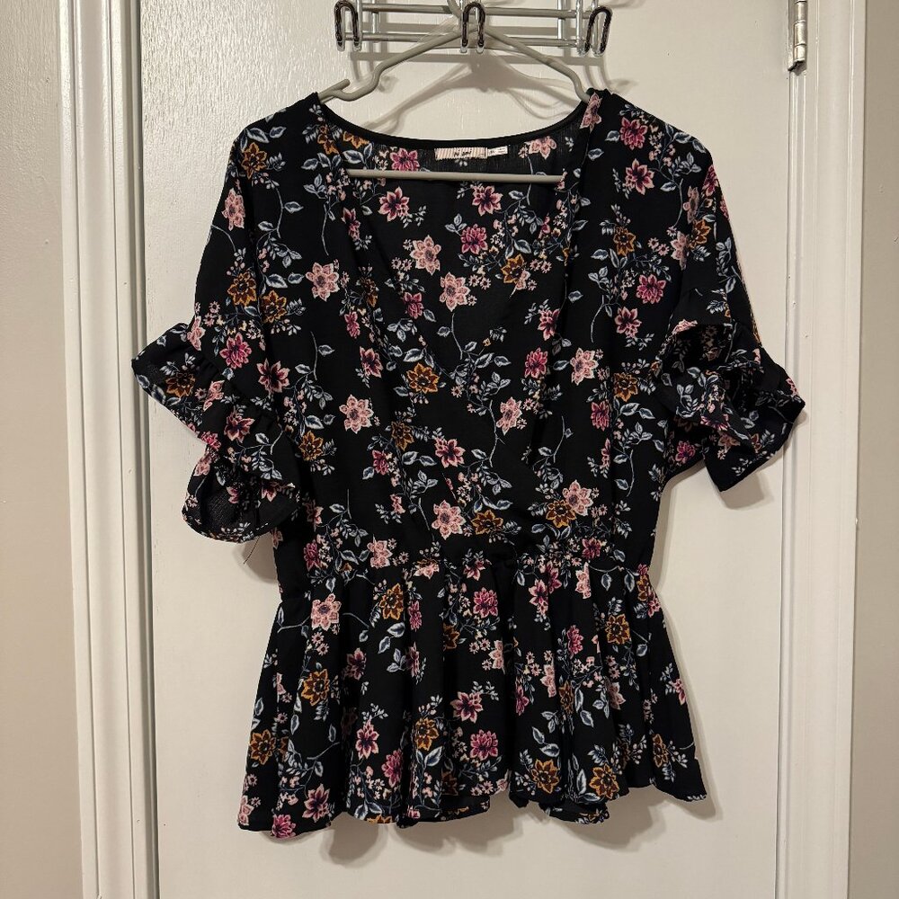 Black floral peplum wrap top